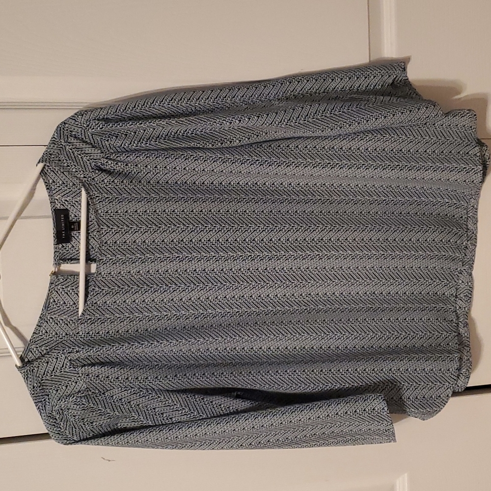 Cute 3/4 sleeve blouse from The Limited. In very good condition.